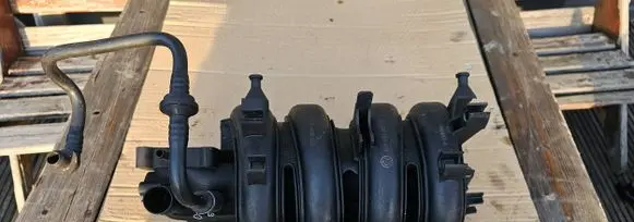 Volkswagen Golf V Intake manifold 036129711FM