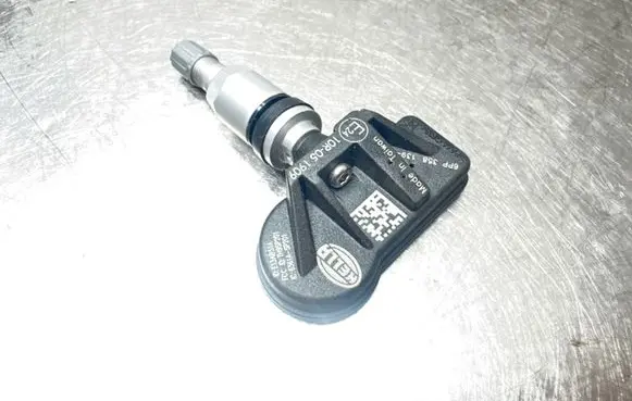 Opel Meriva A Tire pressure sensor 10R051909 E13AB51A 6PP358139191