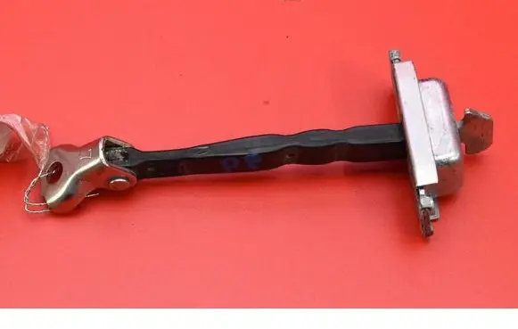 Front door check strap stopper