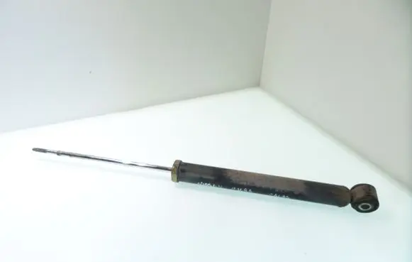 Nissan Micra Rear shock absorber/damper 56200AX602 03061000513