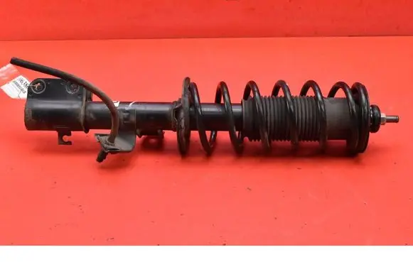 Nissan Micra C+C Front shock absorber/damper 543025FA0D