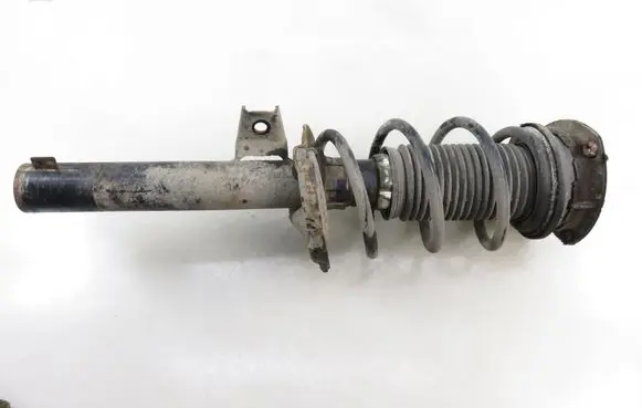 Volkswagen Golf VII Front shock absorber with coil spring 5Q0413023GQ