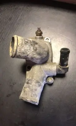 Thermostat/thermostat housing