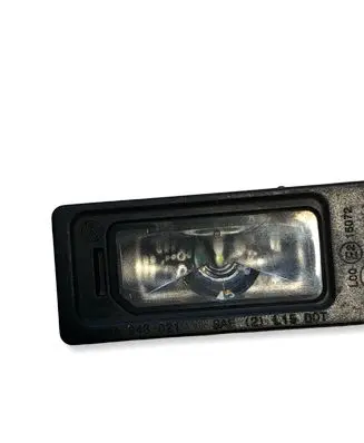 Volkswagen Jetta VII Number plate light 5NA943021