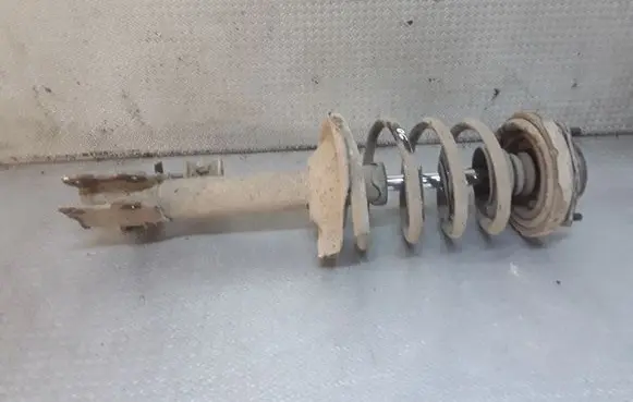 Nissan X-Trail T30 Rear shock absorber with coil spring 
