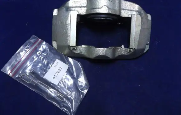 Renault Clio I Front brake caliper 54486 7701202985 UBD