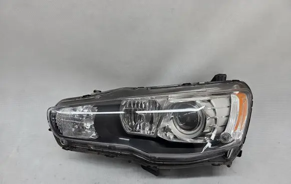 Mitsubishi Lancer VIII Headlight/headlamp 8301C3-47 EBM921-23