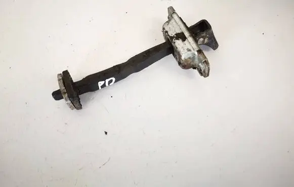 Front door check strap stopper