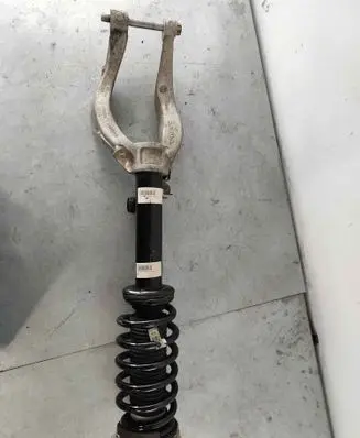 Front shock absorber with coil spring