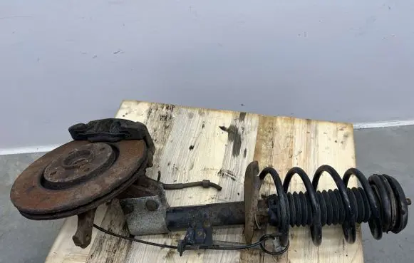 Peugeot Partner Front shock absorber with coil spring