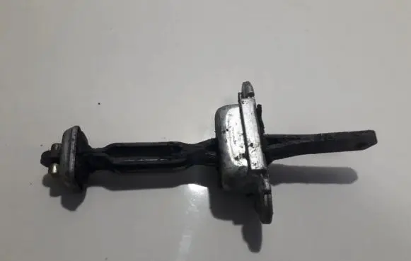 Nissan Almera Front door check strap stopper 