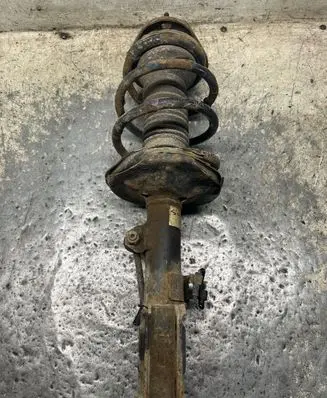 Toyota Avensis T250 Front shock absorber with coil spring
