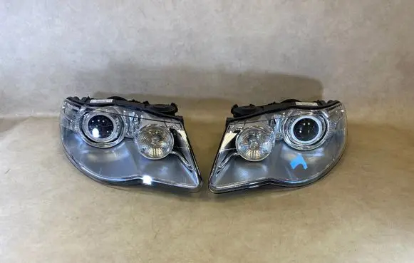 Volkswagen Touareg II Headlights/headlamps set 7L6941031C 7L6941032C