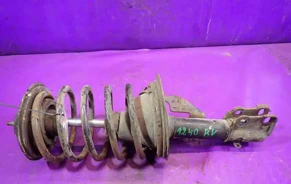 Chrysler LeBaron Front shock absorber with coil spring 