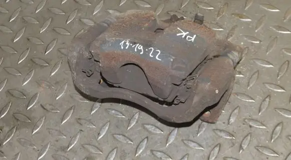 Mazda 3 II Front brake caliper