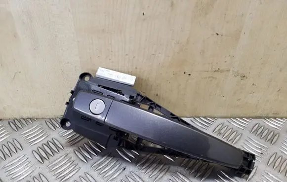 Opel Astra J Front door exterior handle 14096401