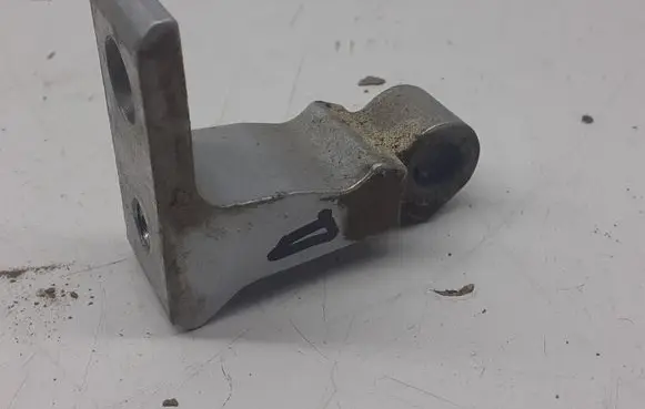 Front door lower hinge