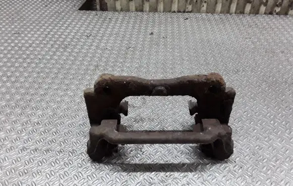 Toyota Avensis T250 Brake caliper pad carrier rear 