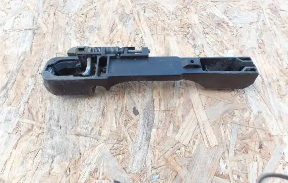 Rear door exterior handle/bracket