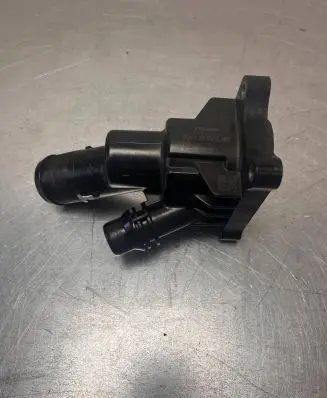 Thermostat/thermostat housing