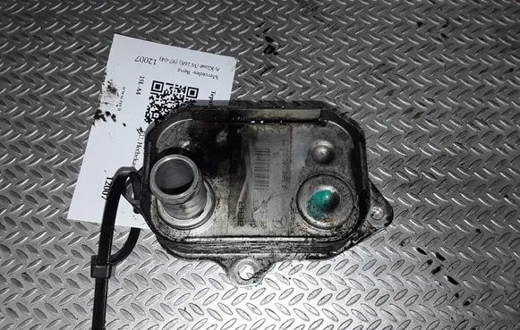 Oil filter mounting bracket