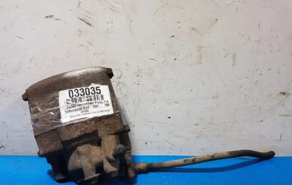 Volkswagen Golf III Front brake caliper