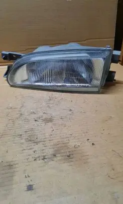 Subaru Impreza I Headlight/headlamp HE842L1