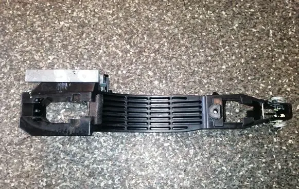Rear door exterior handle/bracket