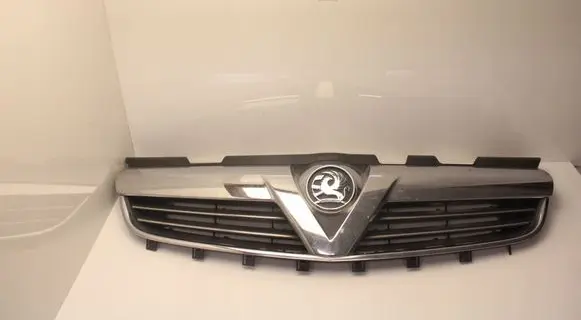 Opel Zafira B Front bumper upper radiator grill 13247327
