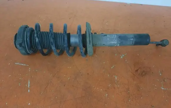 Volkswagen Cross Touran I Front shock absorber with coil spring 1T0413031