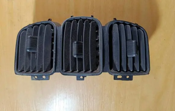 Chrysler Voyager Dash center air vent grill 05009038AA