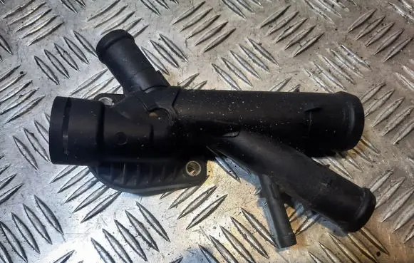 Thermostat/thermostat housing