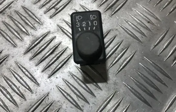 Nissan Primera Headlight level height control switch