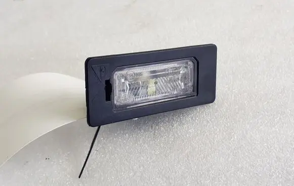 Porsche Panamera (970) Number plate light 7PP943021