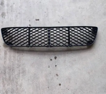 Mazda 323 Front bumper lower grill B30P501T1