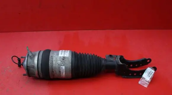 Volkswagen Touareg II Front shock absorber/damper 7P6616404H