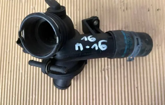 Thermostat/thermostat housing