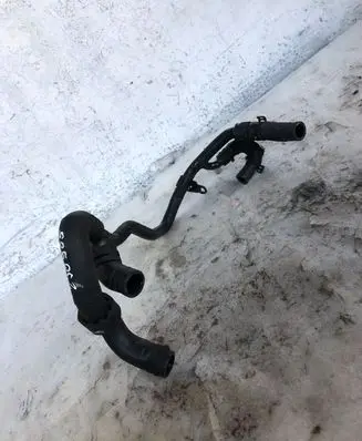 Volkswagen Touran III Engine coolant pipe/hose 04l122058d