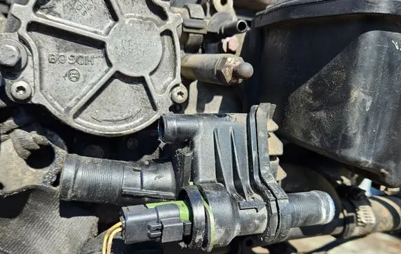 Thermostat/thermostat housing