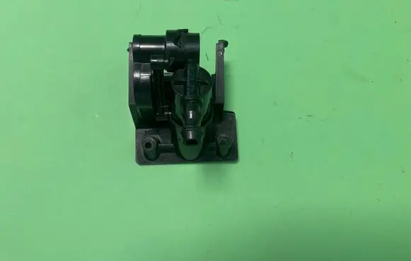 Headlight washer spray nozzle