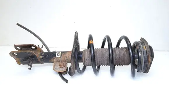Nissan Leaf I (ZE0) Front shock absorber with coil spring 543033NA0C