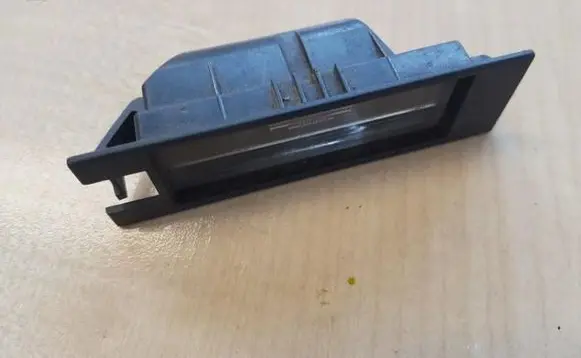 Opel Zafira B Number plate light 09164143