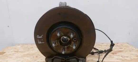 Front wheel hub spindle knuckle