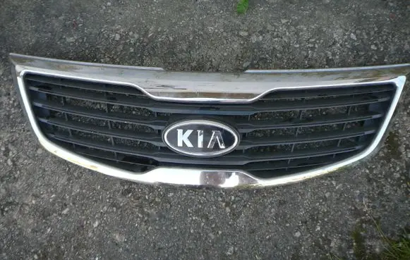 KIA Sportage Front bumper upper radiator grill 863523W000