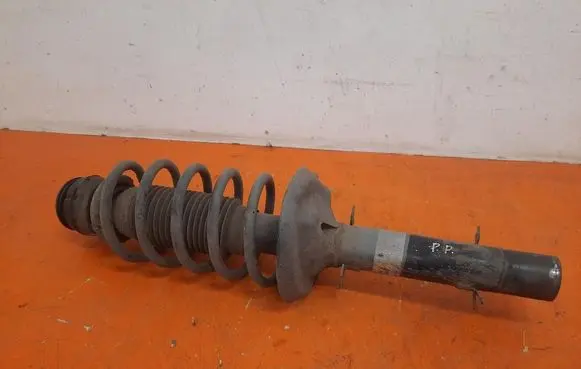 Volkswagen Golf IV Front shock absorber with coil spring