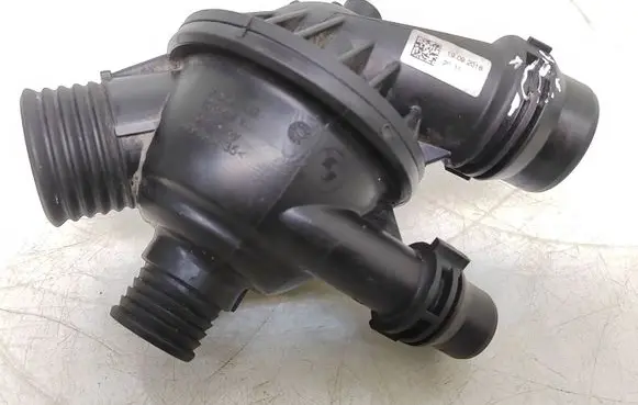 Thermostat/thermostat housing