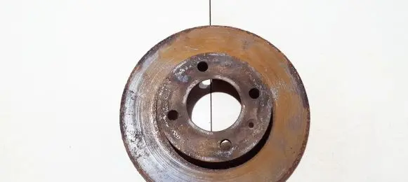 Volkswagen PASSAT B2 Front brake disc neventiliuojamas