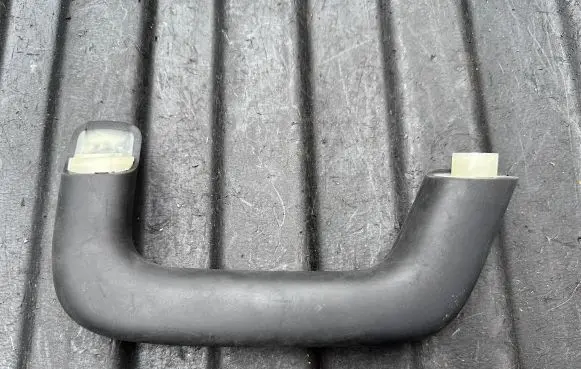Front interior roof grab handle