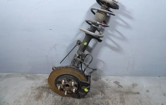 Front shock absorber with coil spring