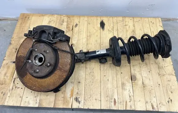 Front shock absorber with coil spring